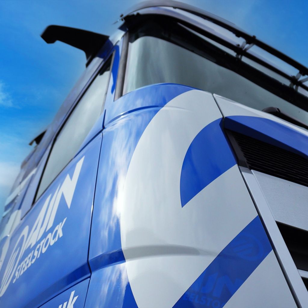 Indigo Ross vehicle wrap finish: a close-up of the high-gloss graphics for AJN Steelstock