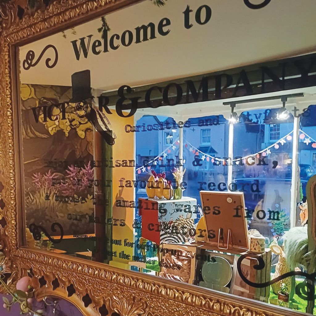 Bespoke "Welcome to Victor & Company" mirror decal.